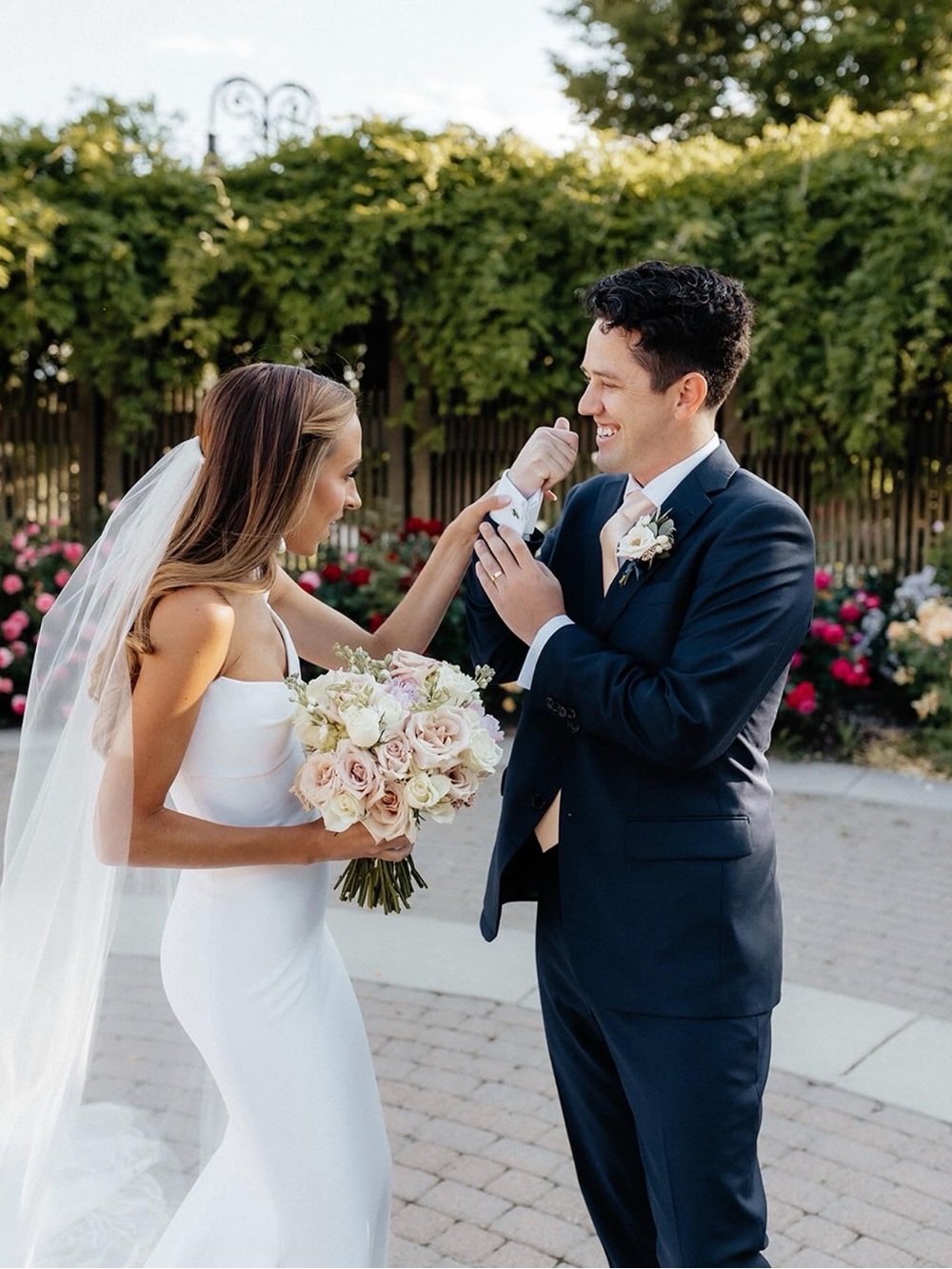 Elegant White Bridal Gown with Botanical Veil